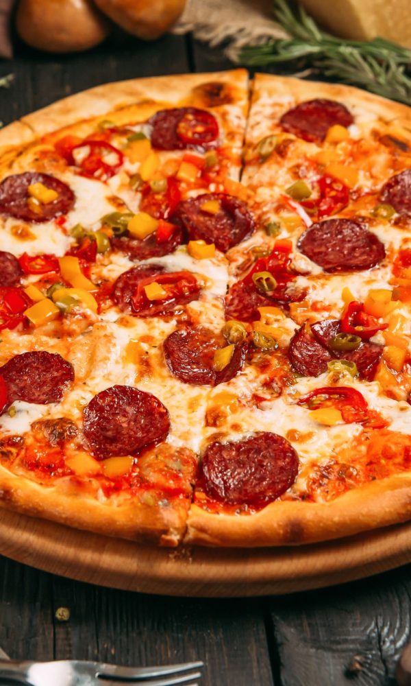 delicious-savory-pizza-with-pepperoni-pepper-black-board-dark-wooden-background delicious-savory-pizza-with-pepperoni-pepper-black-board-dark-wooden-background